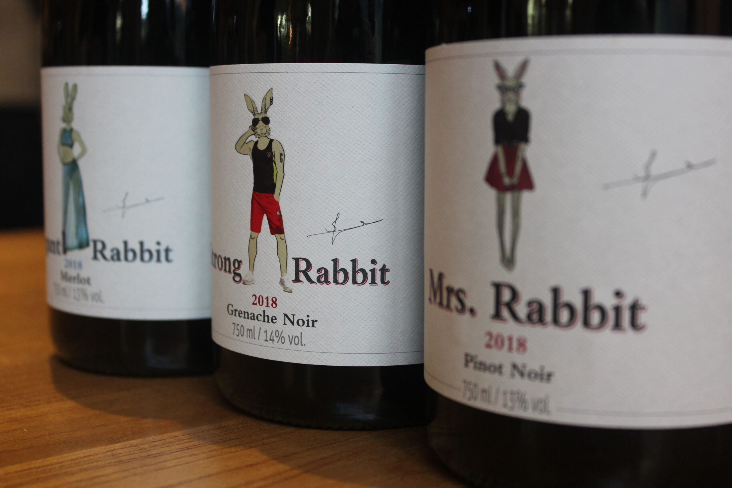 Meet the Rabbit Family labels Close-up of illustrated Rabbit Family wine labels displayed together.